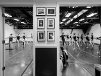 Ballet C class, left, are compromised of 6th graders into their fourth year in ballet, while Ballet D class, right, are fifth and sixth year dancers.  In the center column of both entrances are photos of New Bedford Ballet alumnus who have gone on to dancing at prestigious productions across the country.    [ PETER PEREIRA/THE STANDARD-TIMES/SCMG ]